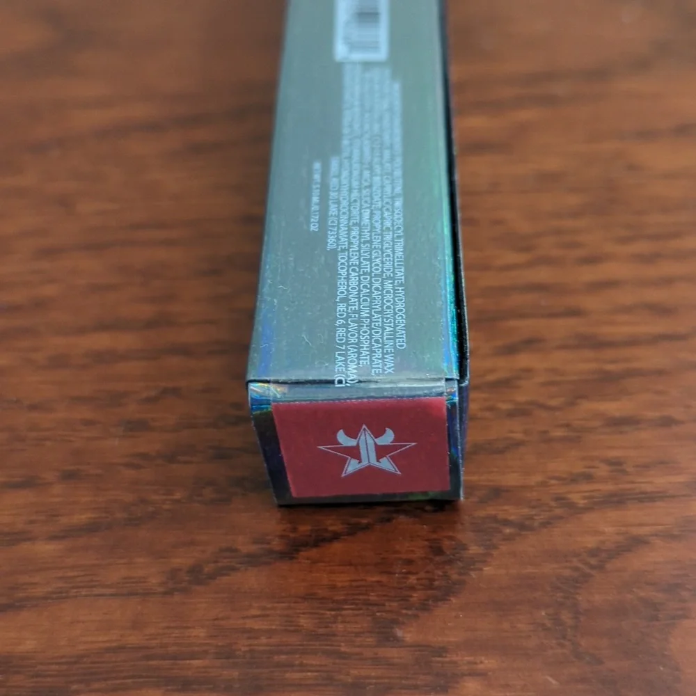 Jeffree Star Cosmetics Supreme Lip Gloss in Peachy Orange Red